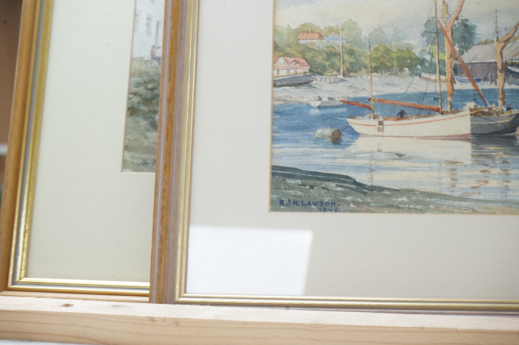 Jim Birt (20th. C), watercolour, Cornish town scene with beached fishing boats, together with R J N Lawson, a similar watercolour dated 1948, 19 x 27cm